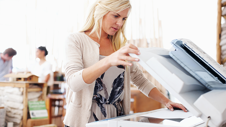 Person using a copy machine