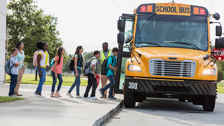 Kids boarding bus
